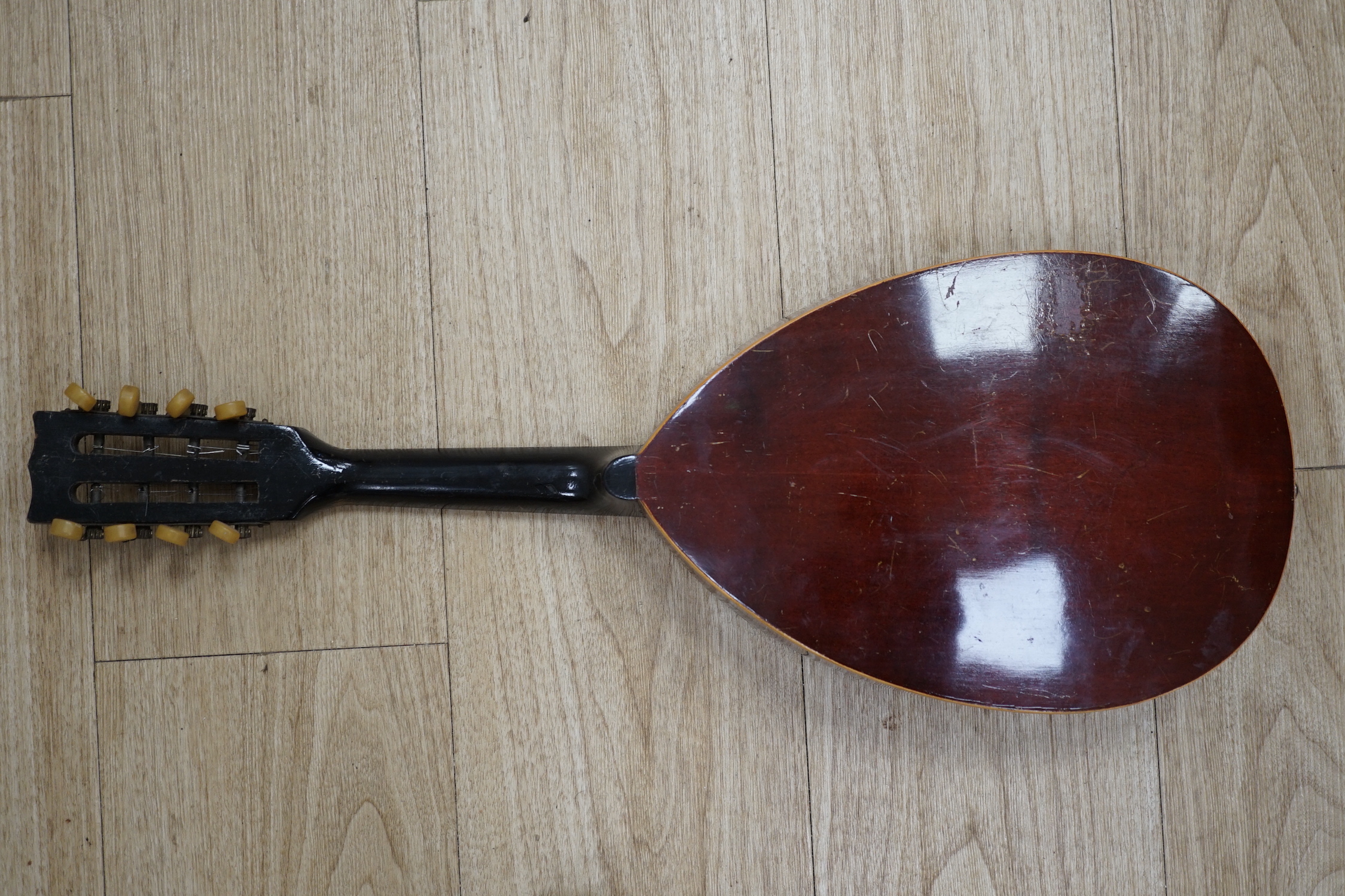 A 1920's Swiss flat backed mandolin, length of body 31cm